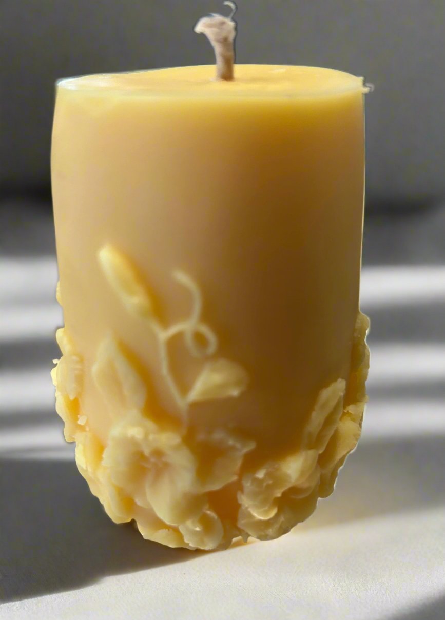yellow floral candle
