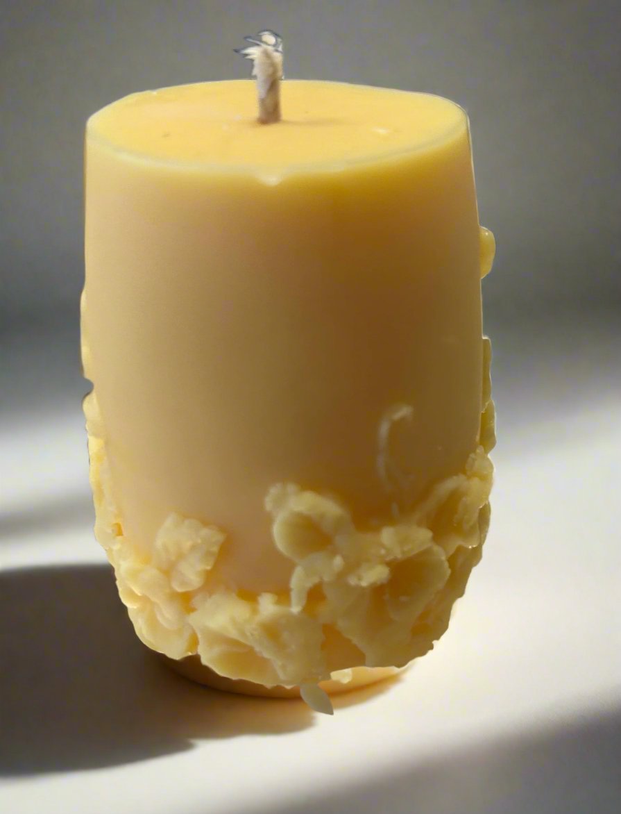 yellow floral candle